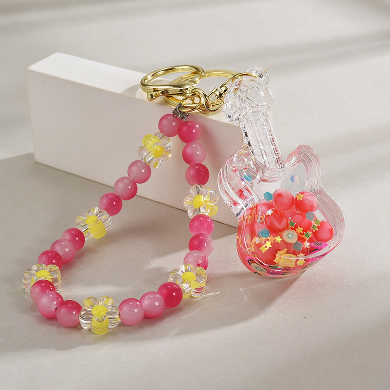 Wholesale Acrylic Oil in Quicksand Bottles, Luminous Violins, Beaded Chains, Keychains